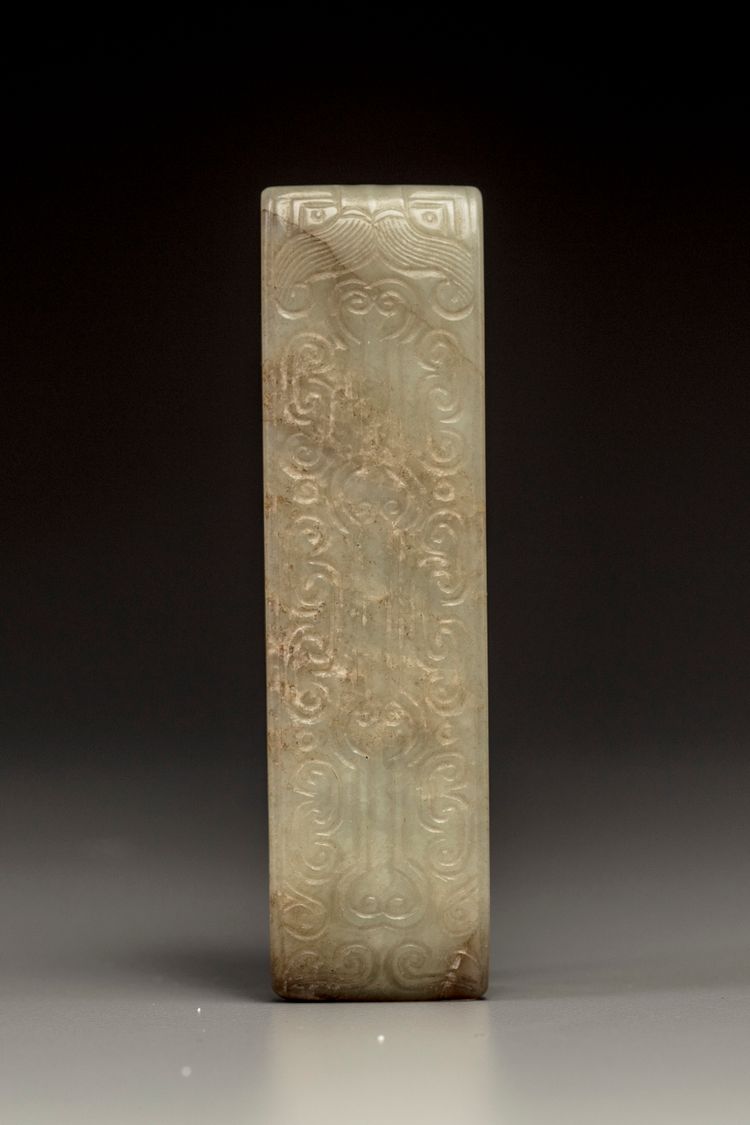 A celadon jade sword slide