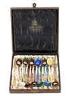 TWELVE NORWEGIAN SILVER AND ENAMEL COFFEE SPOONS, MID 20TH CENTURY