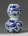 A Chinese blue and white ‘dragons’ double gourd vase
