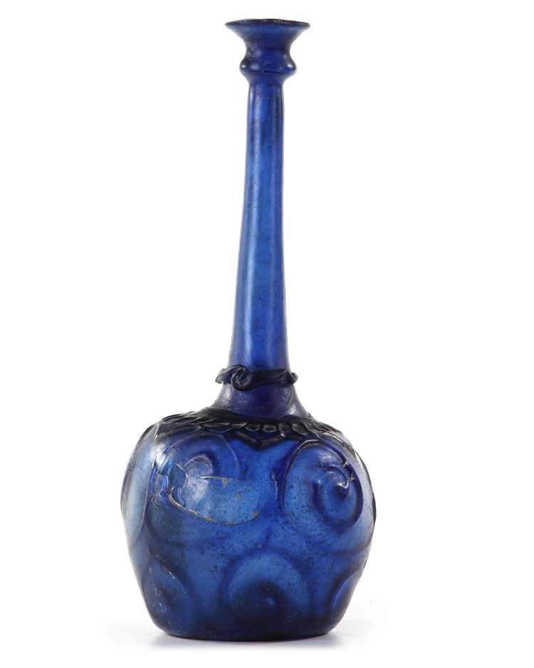 A LARGE MOULD-BLOWN BLUE GLASS BOTTLE-VASE OR SPRINKLER, PERSIA, 12TH CENTURY