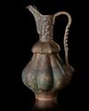 A KHORASSAN  BRONZE EWER, PERSIA, 11TH CENTURY