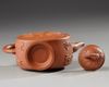 A Chinese yixing 'peony and chilong' flattened teapot and cover