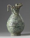 A large Chinese bronze hinged ewer and cover