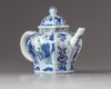 A blue and white hexagonal teapot and cover