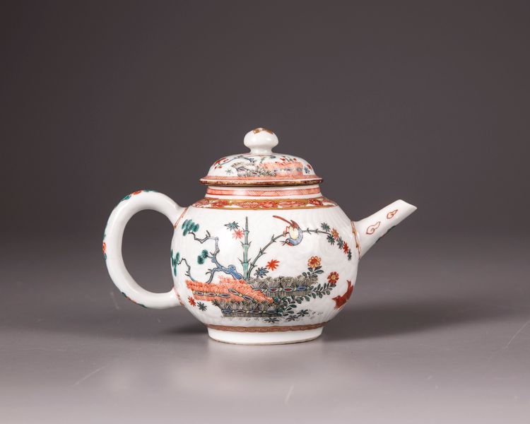 A Chinese Dutch-decorated carved-surface 'three friends of winter' teapot