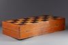 A Chinese wooden chess game with ivory pins