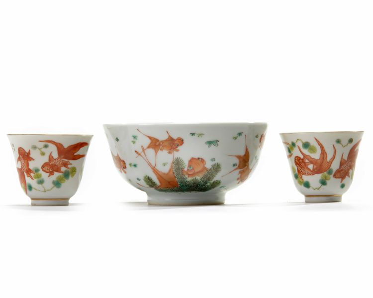 A Chinese famille verte 'goldfish' bowl and a pair of 'goldfish' cups