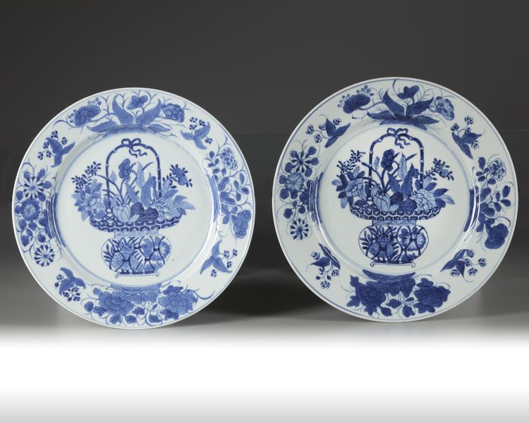 A pair of Chinese blue and white 'flower basket' dishes