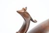 A stylised bronze phoenix-bird on a black lacquered plinth in a box