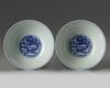 A pair of Chinese blue and white 'dragon' bowls
