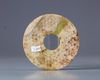 A carved jade Bi disc