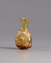 A ROMAN GLASS FLASK, CIRCA 3RD CENTURY AD