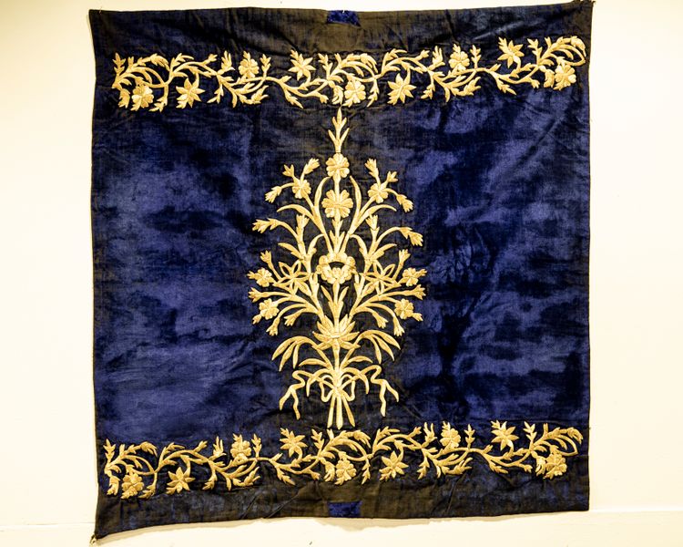 An Ottoman deep blue embroidered wrapping cloth bohca