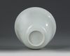 A Chinese white-glazed anhua-decorated 'dragon' cup