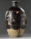 A Chinese carved Cizhou pottery jar