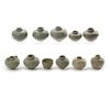 NINE SMALL CHINESE CELADON JARS AND A CUP, 13TH-14TH CENTURY