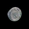 AN EARLY ISLAMIC GLASS WEIGHT OF HALF DINAR