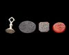 FOUR PERSIAN AGATE AND SILVER SEALS, QAJAR PERIOD, 19TH CENTURY