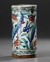 AN OTTOMAN IZNIK POTTERY TANKARD, TURKEY 17TH CENTURY