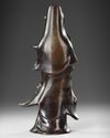 A CHINESE BRONZE FIGURE OF GUANYIN, 20TH CENTURY