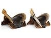 TWO FINELY DECORATED WOOD SADDLES AND A FELT SADDLE COVERS