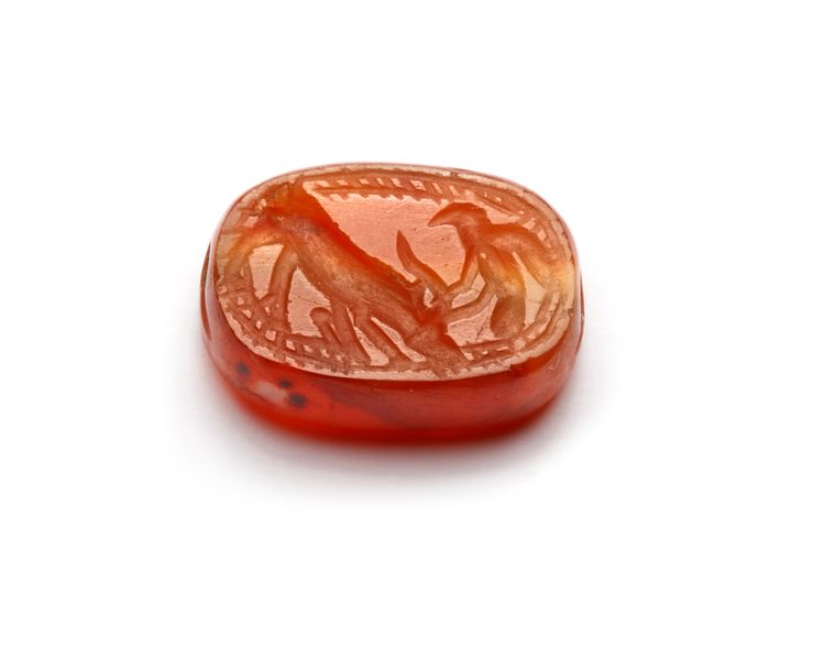 AN EASTERN GREEK CARNELIAN SCARABOID, CIRCA 500 B.C.