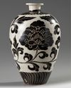 A Chinese Cizhou-style carved meiping