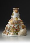 A JAPANESE SATSUMA FIGURE OF SEATED JUROJIN AND A DEER, MEIJI PERIOD (1868-1912)