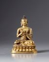 A gilt Chinese bronze buddha