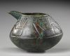 A WESTERN ASIATIC BRONZE SPOUTED VESSEL, CIRCA 8TH-7TH CENTURY B.C.