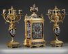A FRENCH ORMOLU ENAMEL CLOCK SET, LATE 19TH CENTURY