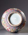 A Chinese famille rose 'millefleurs' double gourd vase