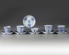 A group of eleven Chinese blue and white cups and saucers