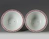 A pair of Chinese famille rose jardinieres and stands