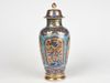 A later-enamelled Chinese blue and white vase and cover