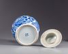 A Chinese blue and white vase with cover