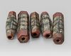 FIVE EARLY ISLAMIC GLASS BEADS MIDDLE EAST, 900–1200 AD