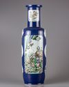 A blue glazed famille verte rouleau vase