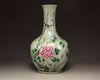 A Chinese celadon-ground famille rose bottle vase