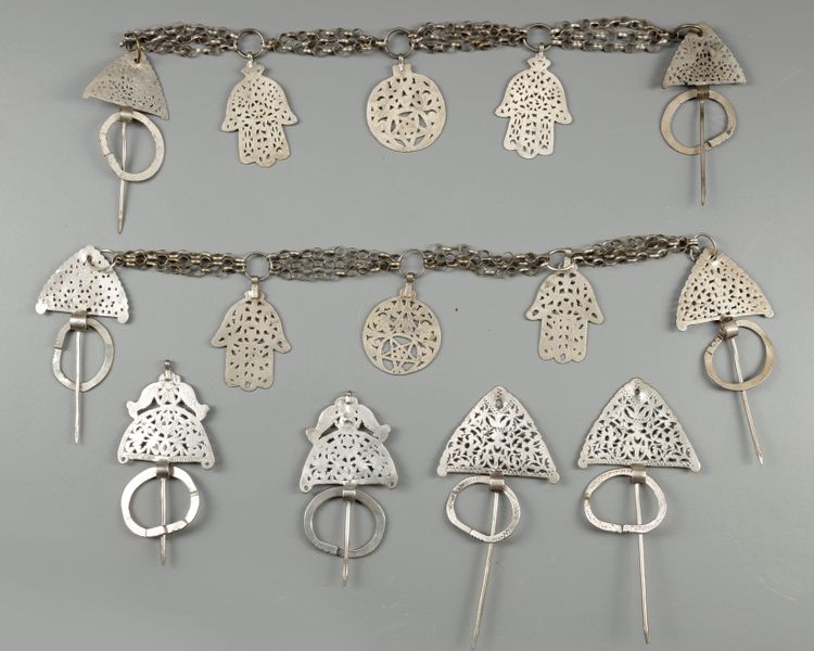 Three pairs of silver fibula's