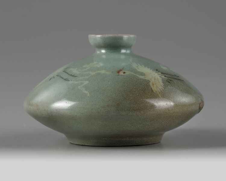 A Korean slip-inlaid celadon-glazed ‘cranes’ oil bottle
