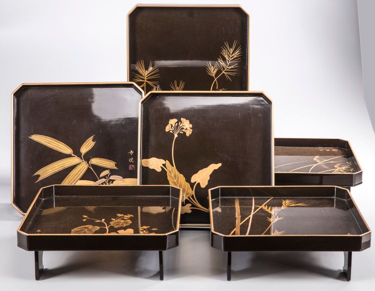 A original set of six lacquered trays in their original box
