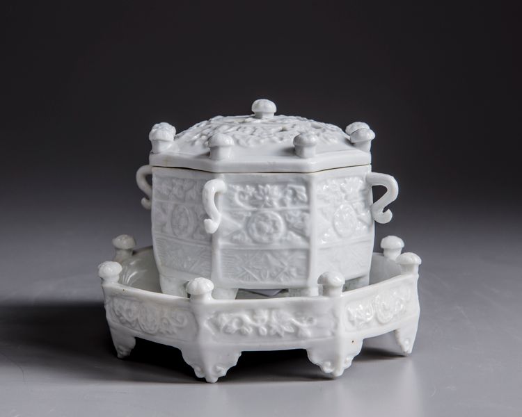 A Chinese Dehua white-glazed 'Marco Polo' censer, cover, and stand