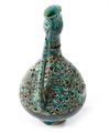 A RARE FRITWARE OPENWORK DECORATED RETICULATED EWER WITH ROOSTER HEAD, PERSIA, 13TH CENTURY