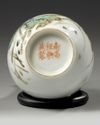 A small Chinese famille rose 'bird and lotus' bottle vase