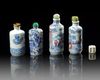 A GROUP OF FOUR CHINESE BLUE AND WHITE 'FIGURAL' SNUFF BOTTLES