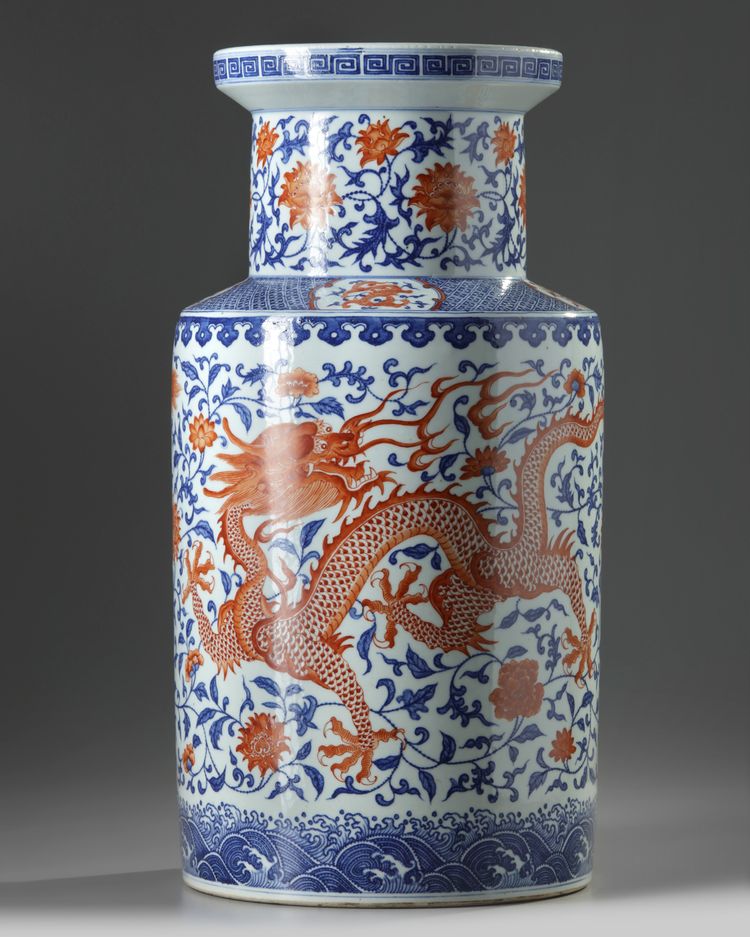 A large Chinese iron-red-decorated blue and white 'dragon and phoenix' rouleau vase