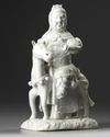 A Chinese Dehua white-glazed figure of Guandi on a horse
