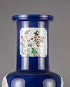 A blue glazed famille verte rouleau vase