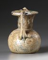 A ROMAN GLASS JAR WITH TWO HANDLES, CIRCA 3RD-4TH CENTURY AD
